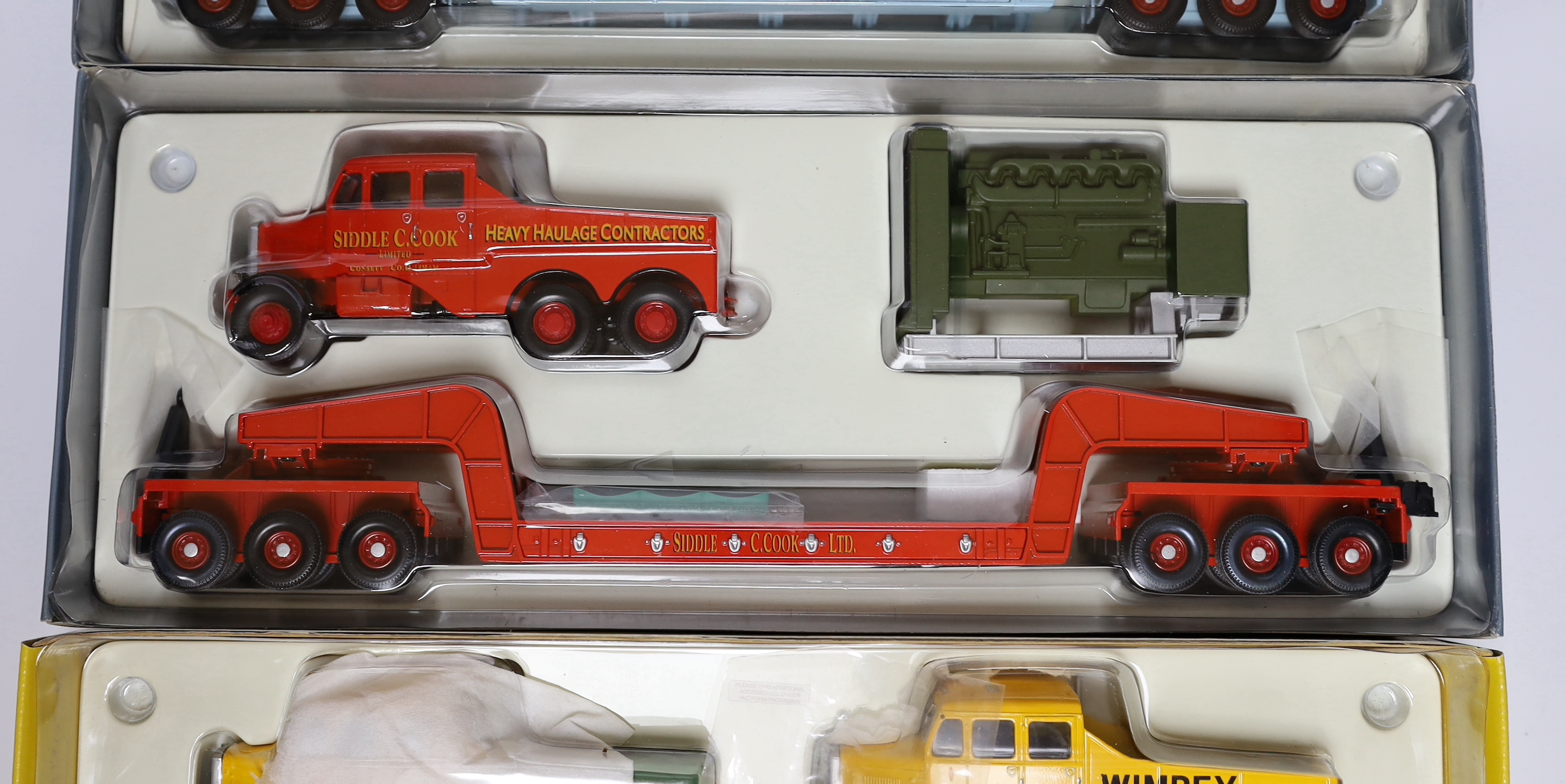 Three boxed Corgi Classics including two Heavy Haulage Scammell Constructors and low loaders (17601 and 17603) and a Building Britain Scammell two-vehicle set (17702)